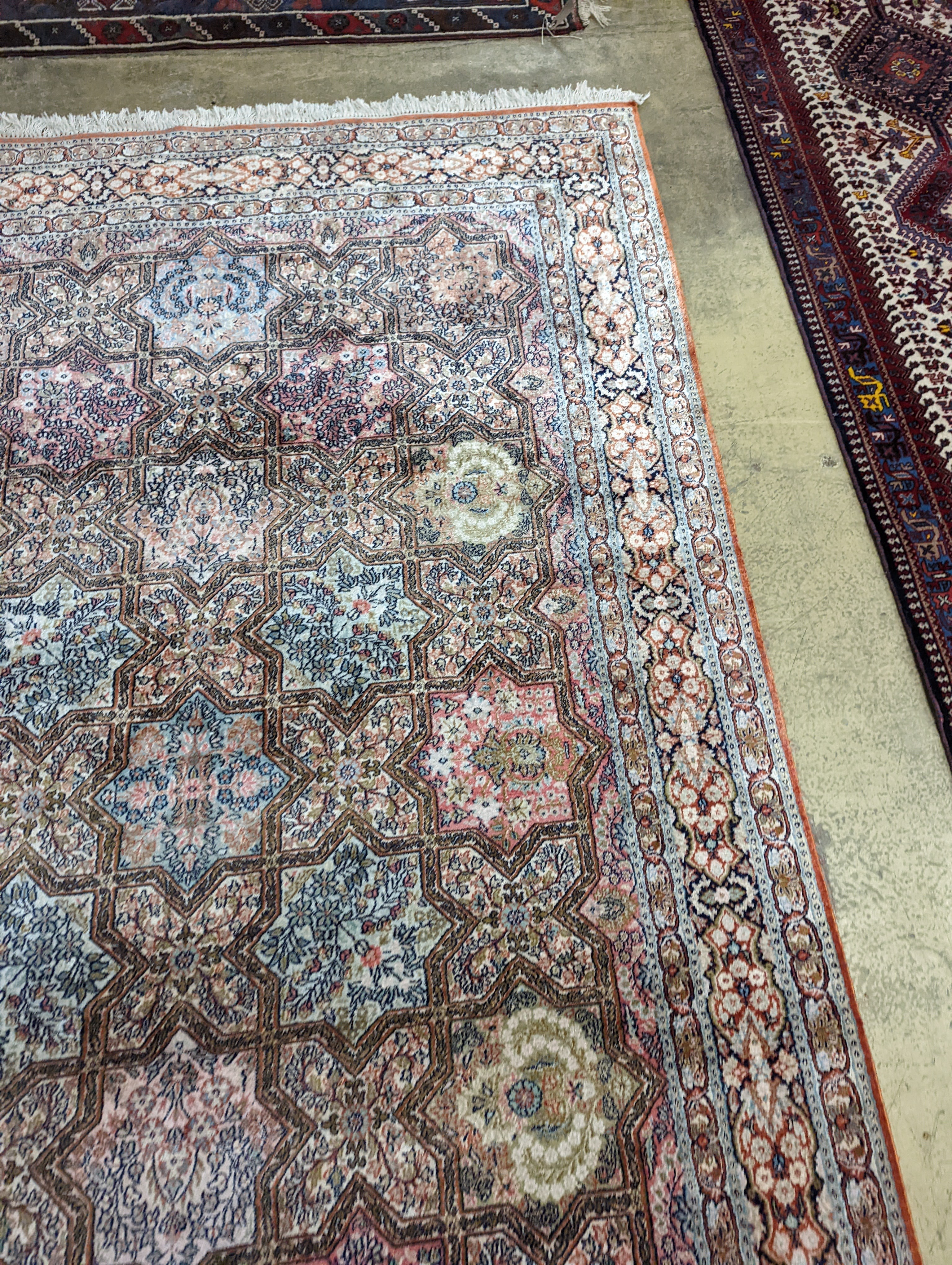 Two Turkish rugs and a Persian rugs. Largest, 284x172cm.